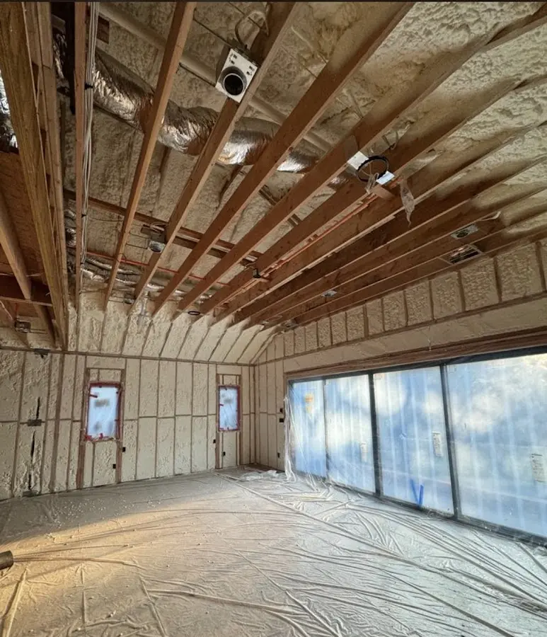 Interior walls and ceiling insulated with spray foam during new construction in Santa Fe